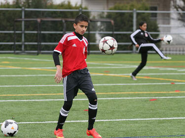 Soccer player practising