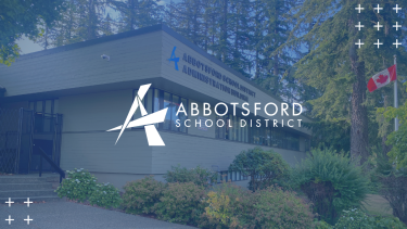 BOE - Cover - Navy Picture of the School Board Office building with Abbotsford logo overtop