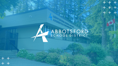 Abby Blue - Cover Image Light blue overlay of a picture with the school board office in the background with the logo in the center.