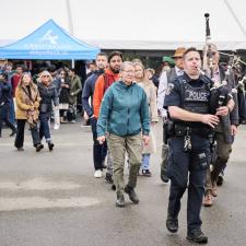Constable Scott McClure Plays Bagpipes at John Davidson Field Naming Ceremony